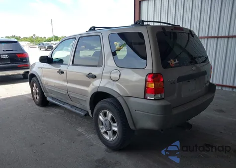 2001 Ford Escape Xlt z USA, uszkodzony, nr VIN 1FMYU03111KF57142